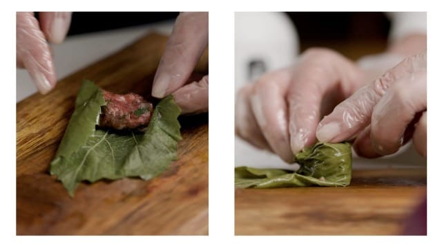 Pictures showing the assembling of stuffed grape leaves for the Greek meal dolmades--Stuffed Grape Leaves.