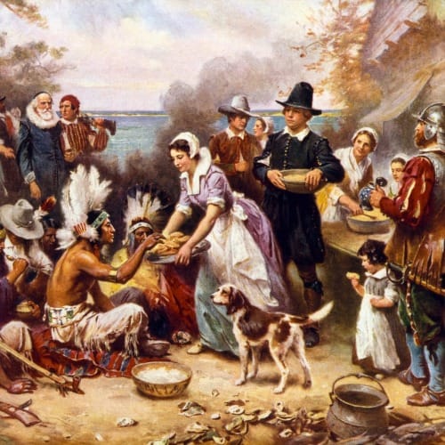 An idealized painting by of the "first Thanksgiving" in America by Jean Louis Gerome Ferris showing people native to the Americas and new immigrants sharing a meal.