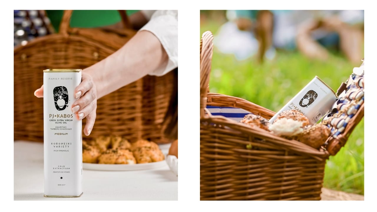 A beautiful picnic basket overflowing with Tiropita Koulouriou and PJ Kabos Extra Virgin Olive Oil