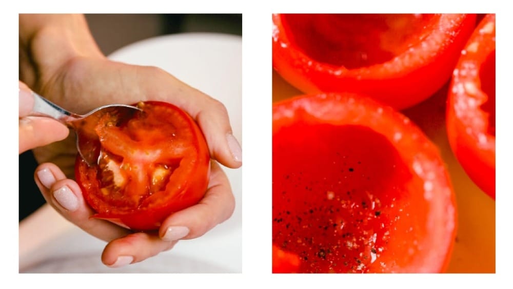 Tomatoes being readied for Stuffed tomatoes. Pulp being scooped out and the insides salted and peppered. 